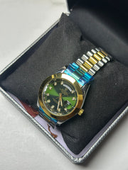 Rolex silver golden green dial day date