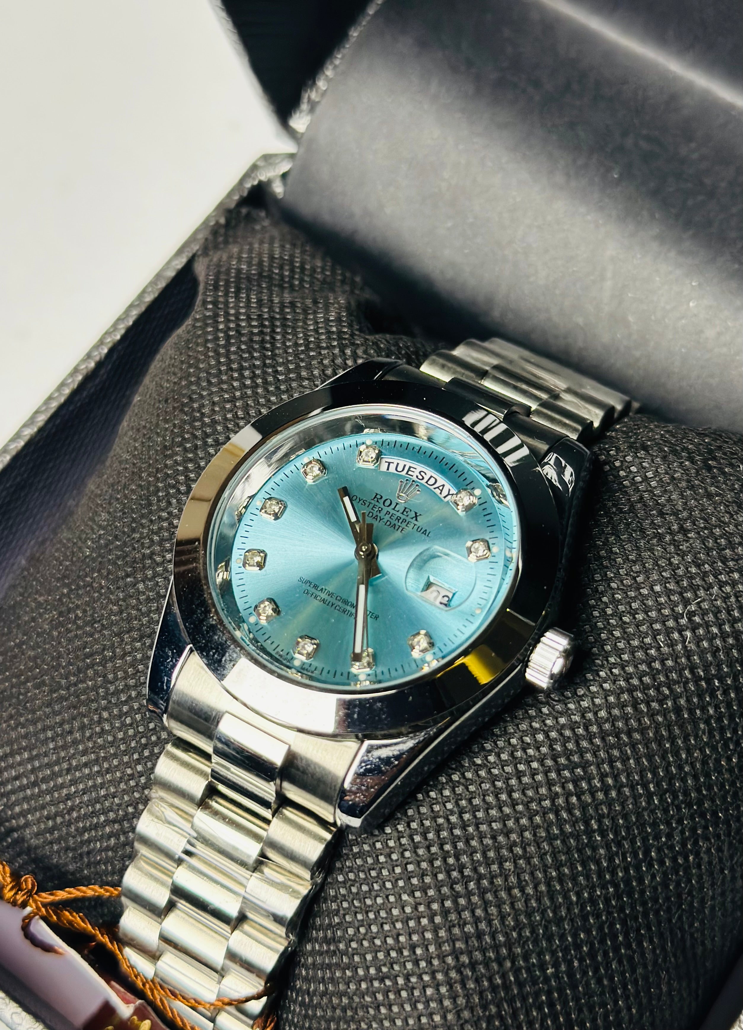 R*lex silver with light blue dial day -date