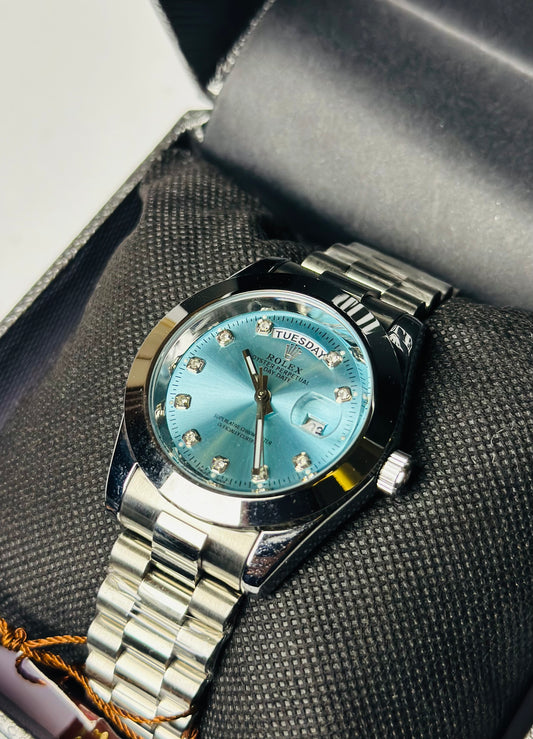 R*lex silver with light blue dial day -date