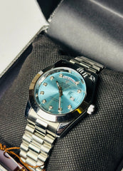 R*lex silver with light blue dial day -date